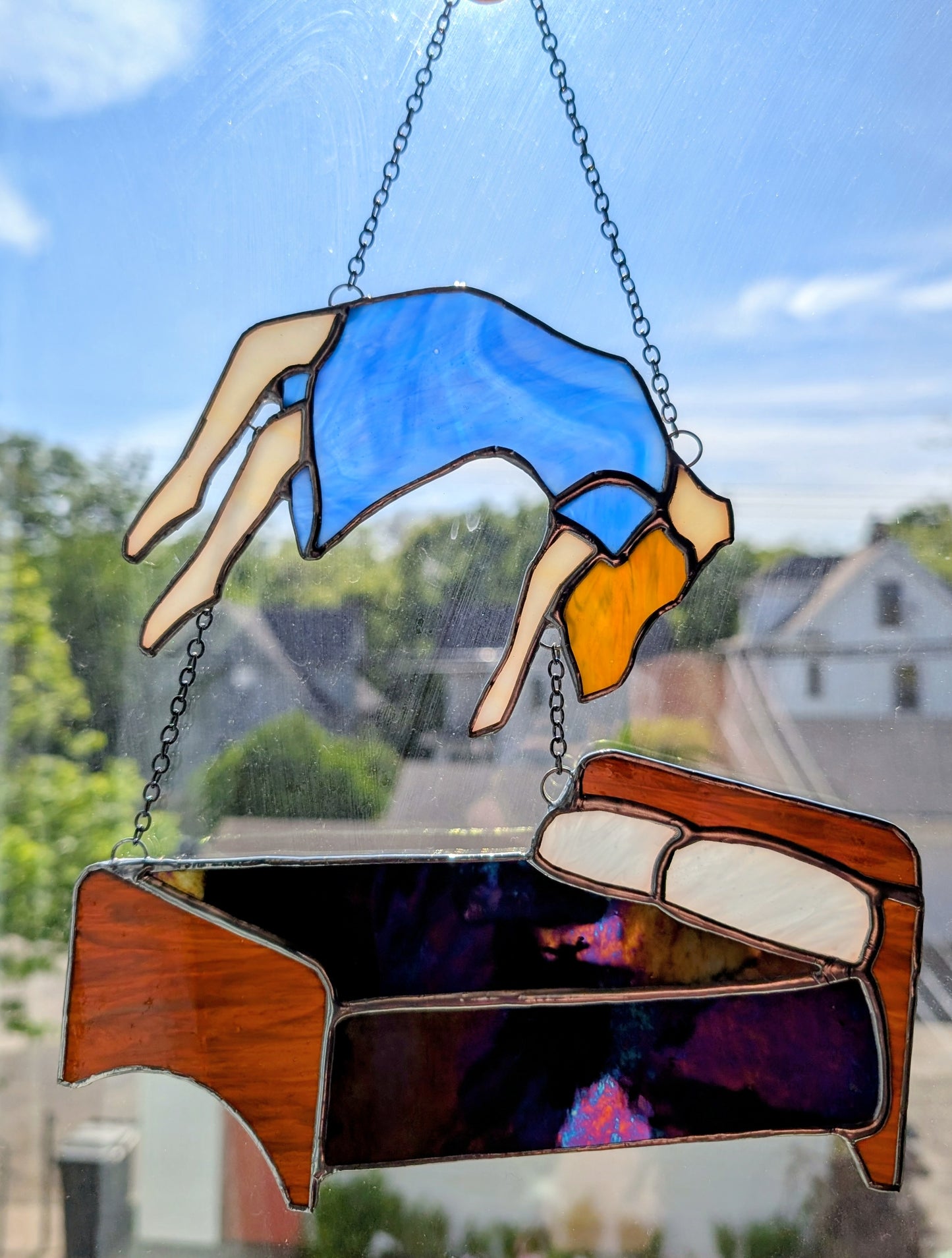 Handcrafted stained glass exorcism horror fan art