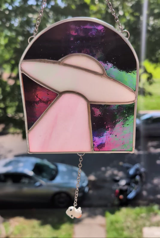 Handcrafted stained glass UFO beaming up a cow pink and black iridescent