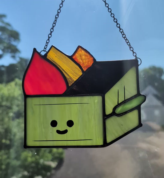 Stained glass sun catcher dumpster fire