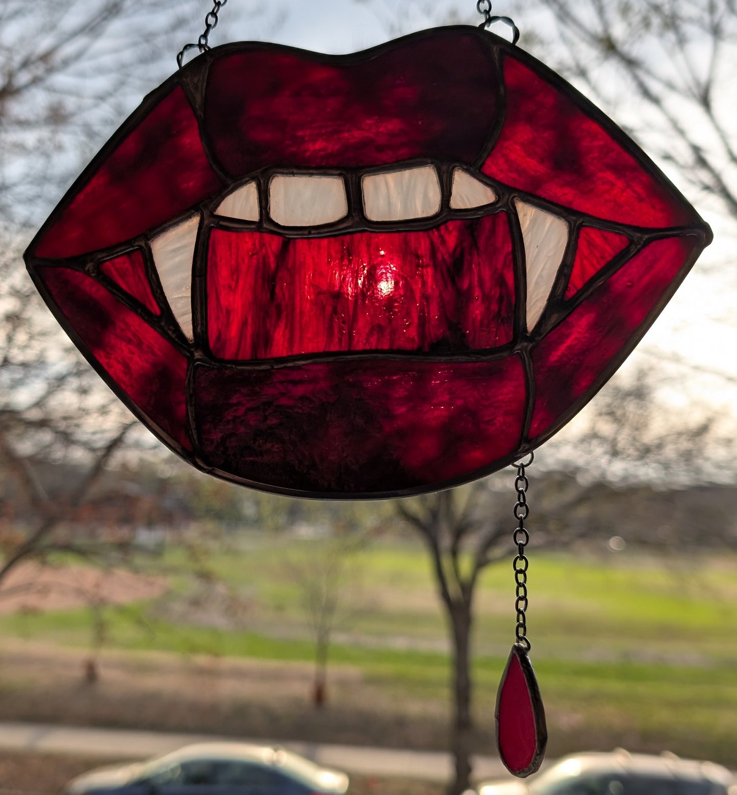 Handcrafted stained glass vampire teeth red lips