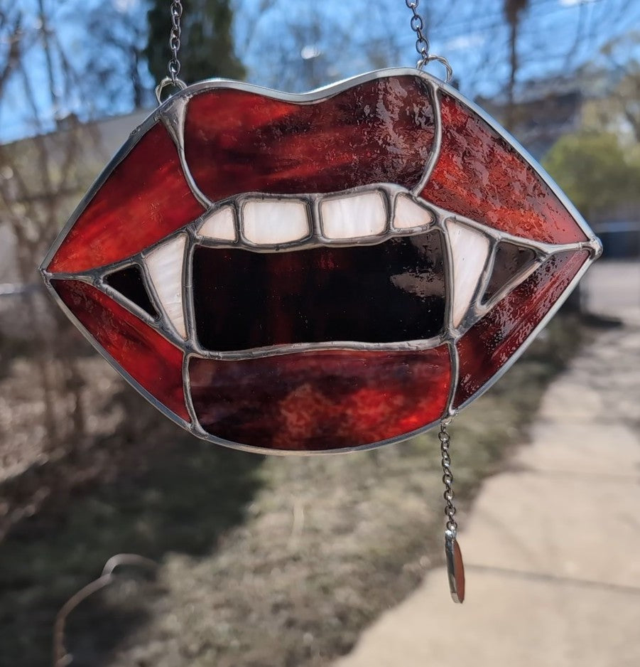 Handcrafted stained glass vampire teeth red lips