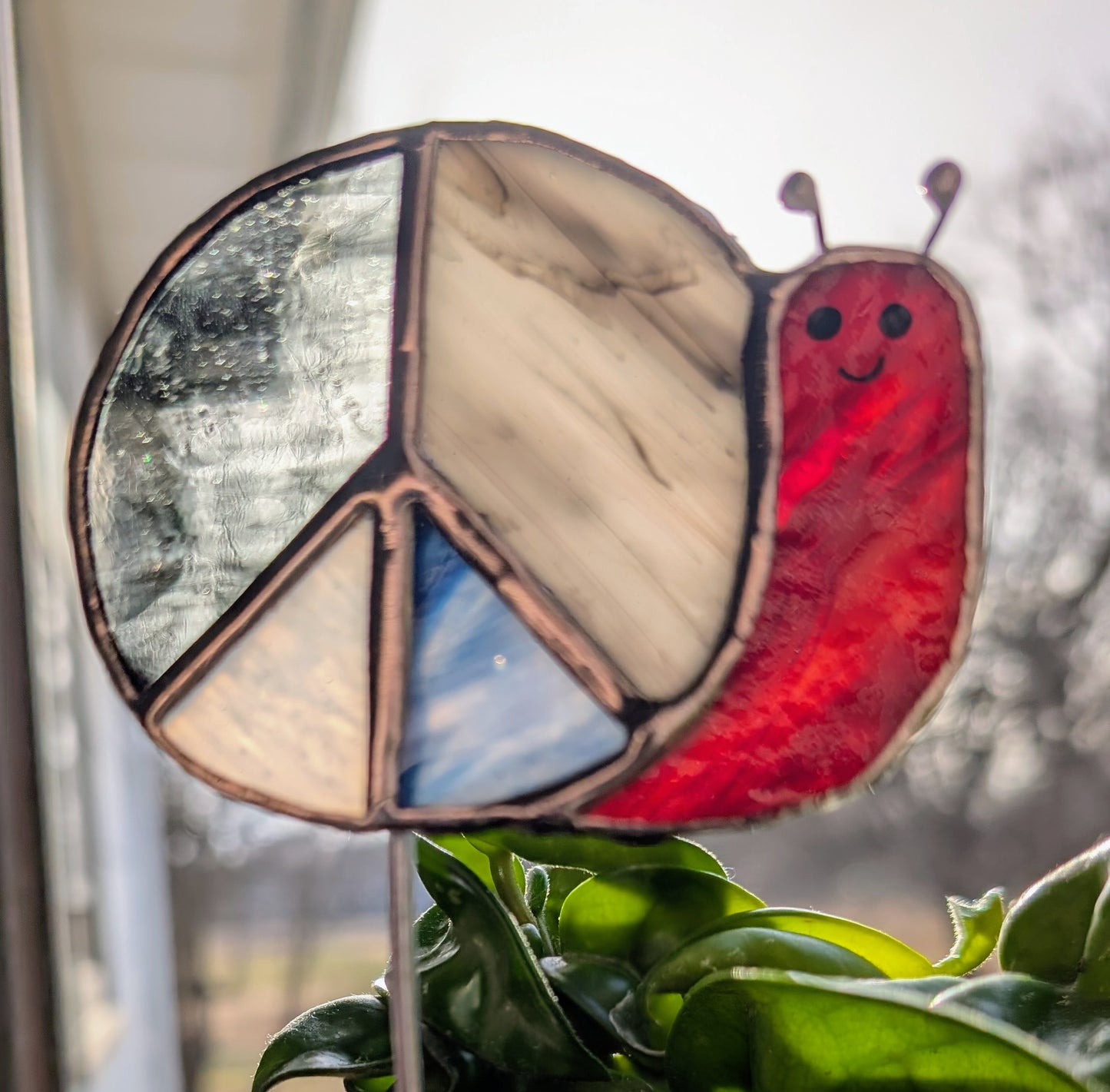 Handcrafted stained glass garden plant stake happy snail