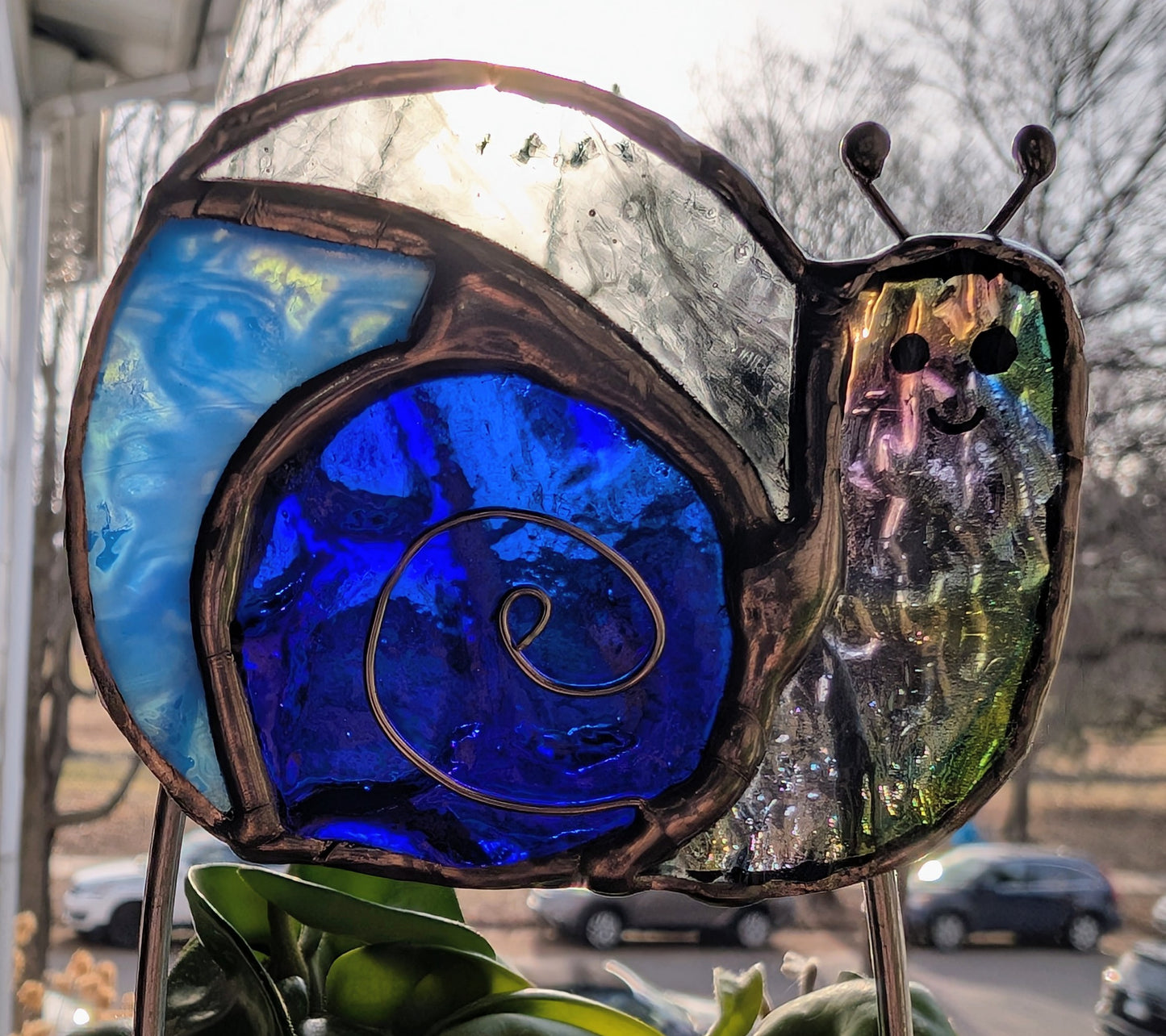 Handcrafted stained glass garden plant stake happy snail