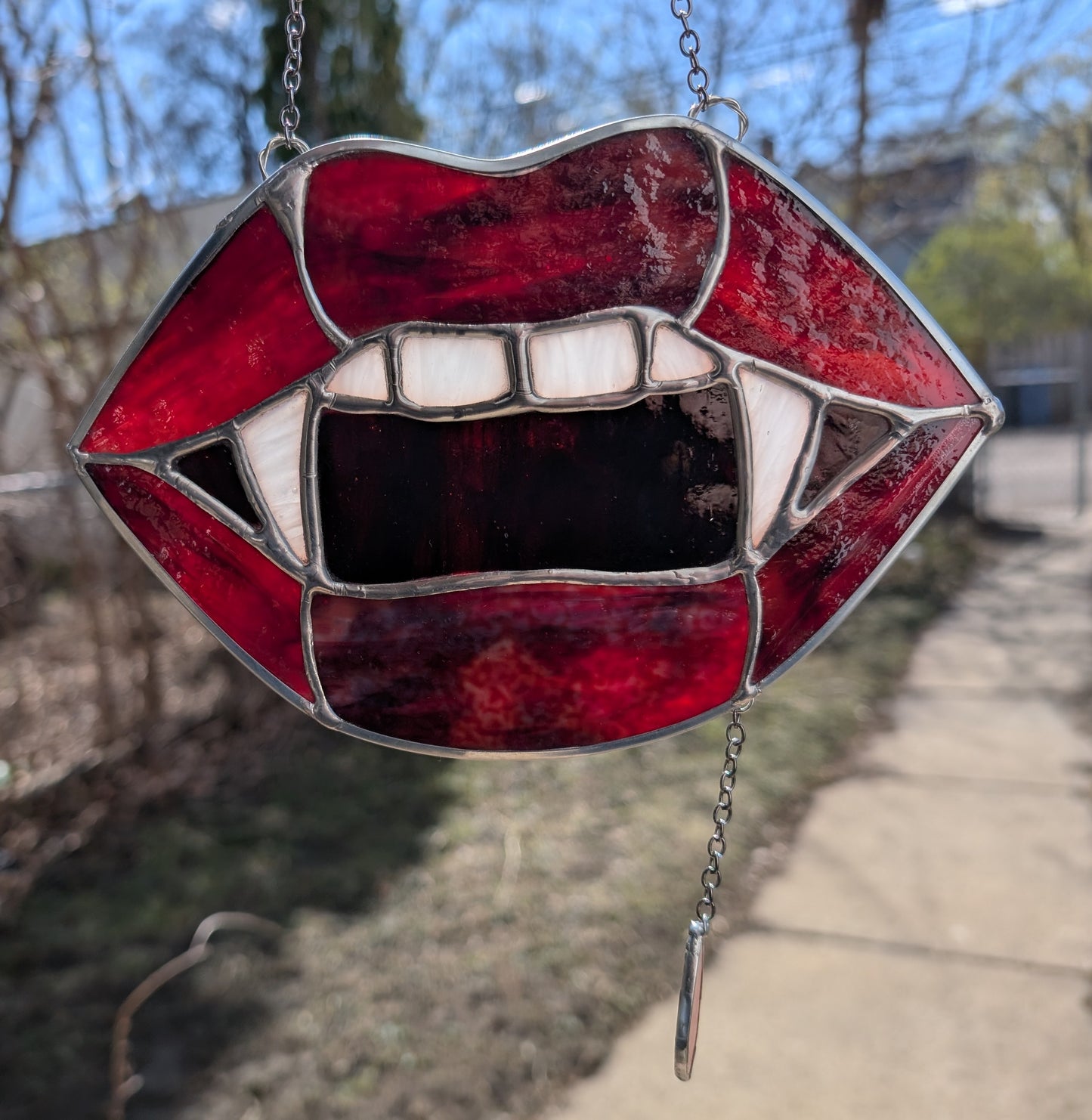Handcrafted stained glass vampire teeth red lips