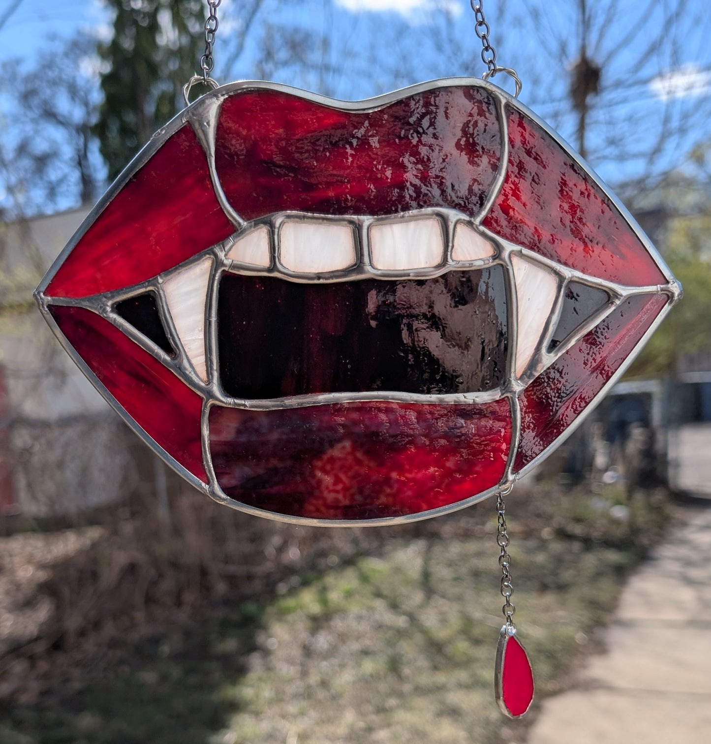 Handcrafted stained glass vampire teeth red lips