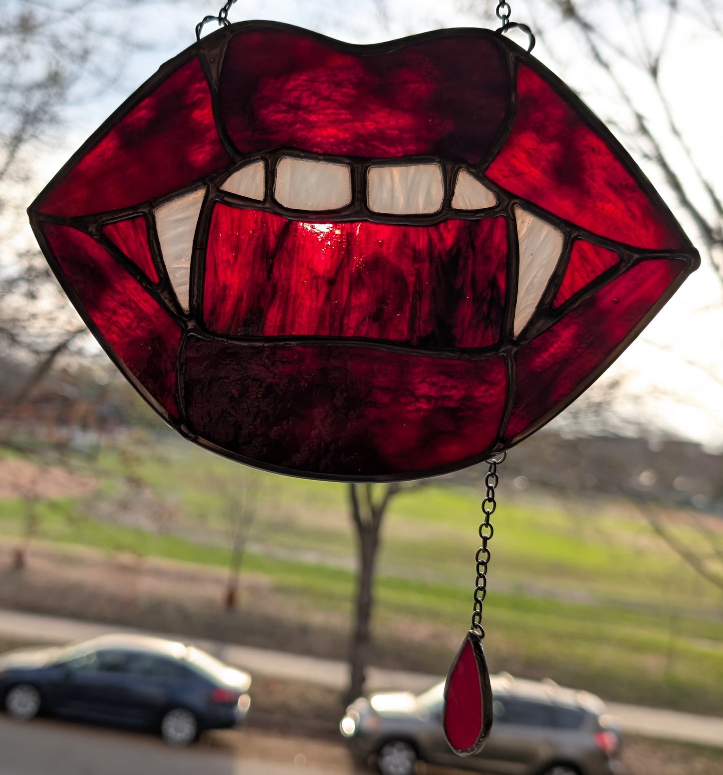 Handcrafted stained glass vampire teeth red lips