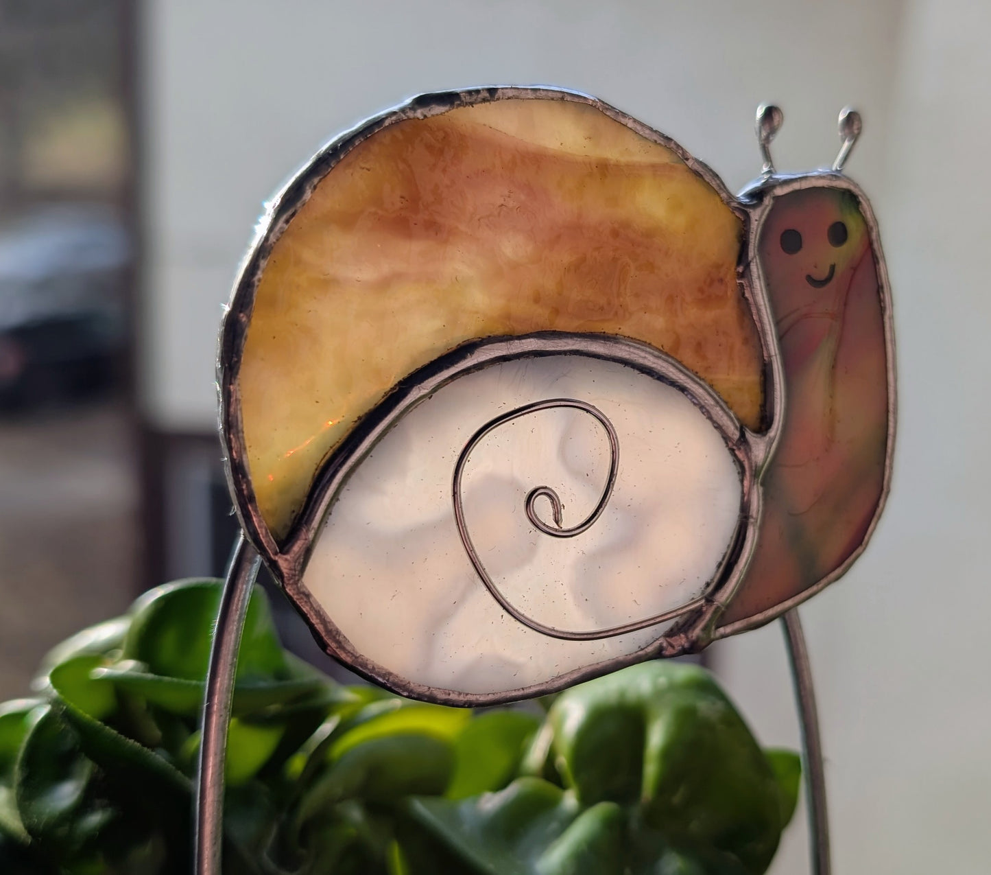 Handcrafted stained glass garden plant stake happy snail