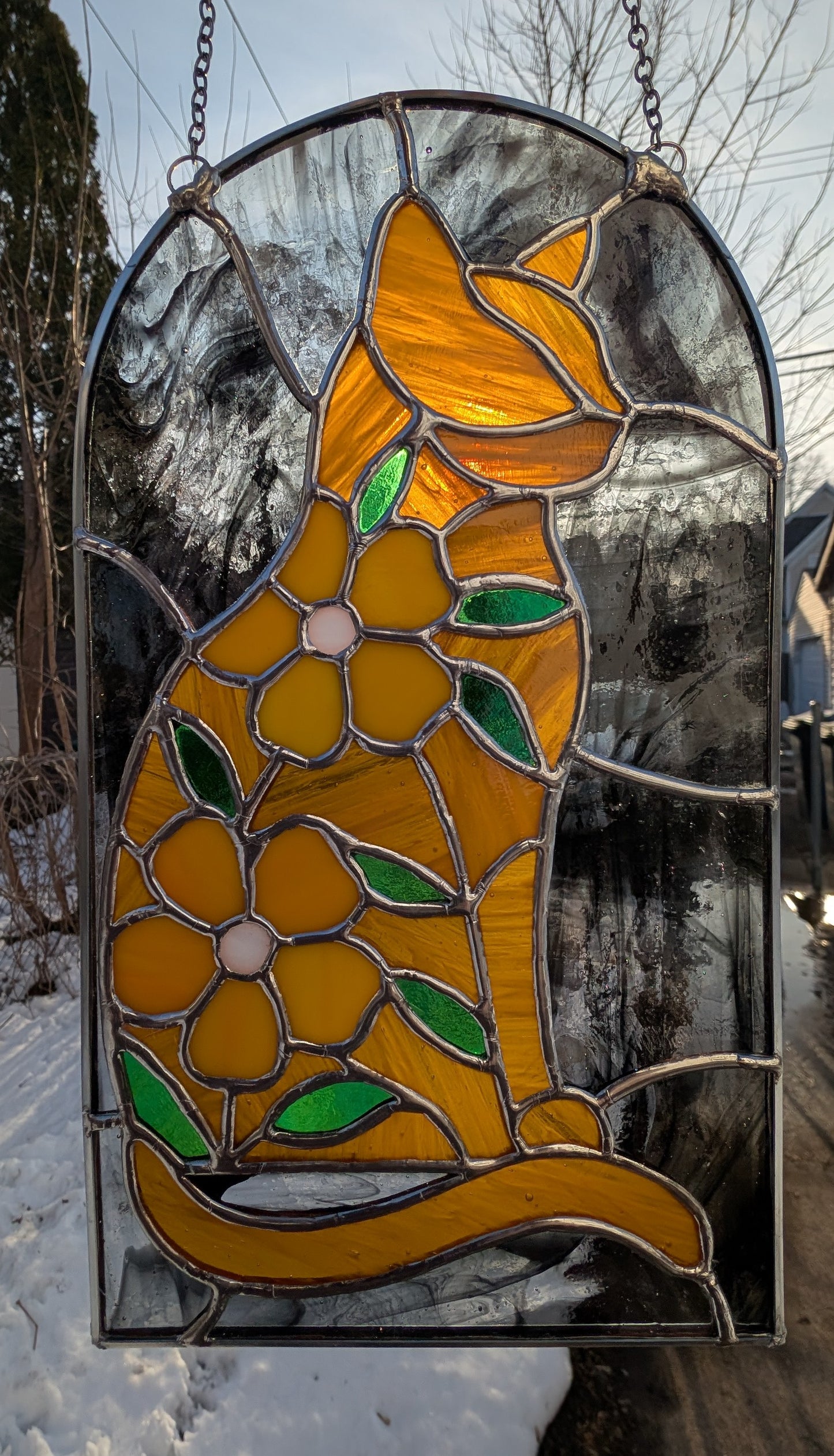 Handcrafted stained glass cat and flowers