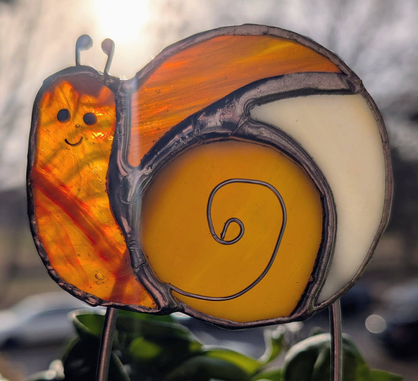 Handcrafted stained glass garden plant stake happy snail