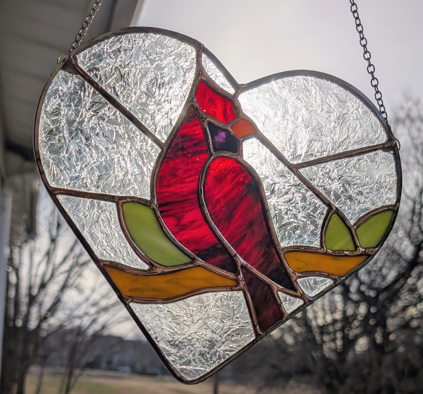 Handcrafted stained glass heart cardinal