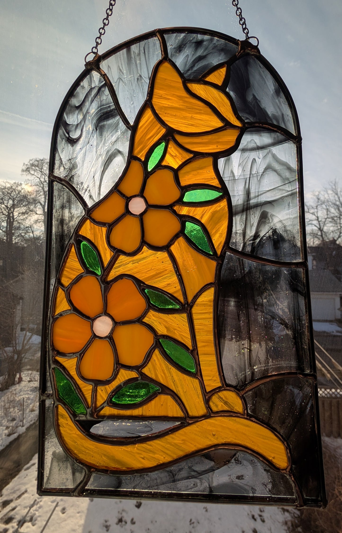 Handcrafted stained glass cat and flowers